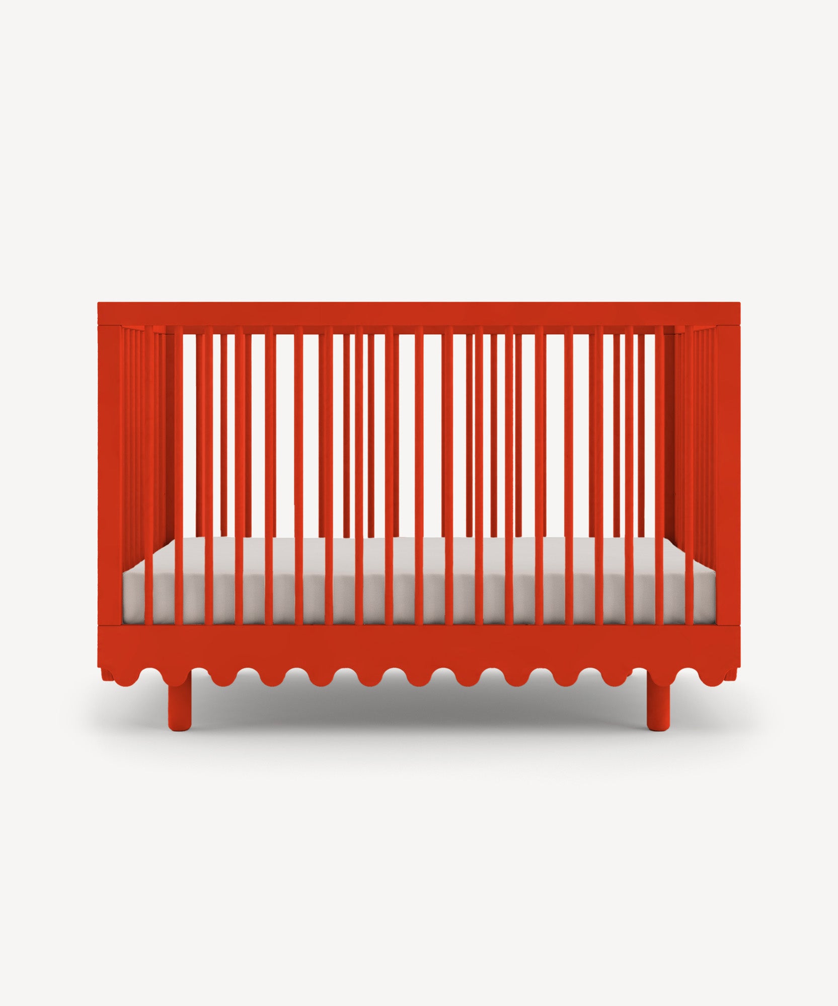 Moss Crib: Red baby crib with slatted sides and decorative wave design at the base, shown on a plain white background.
