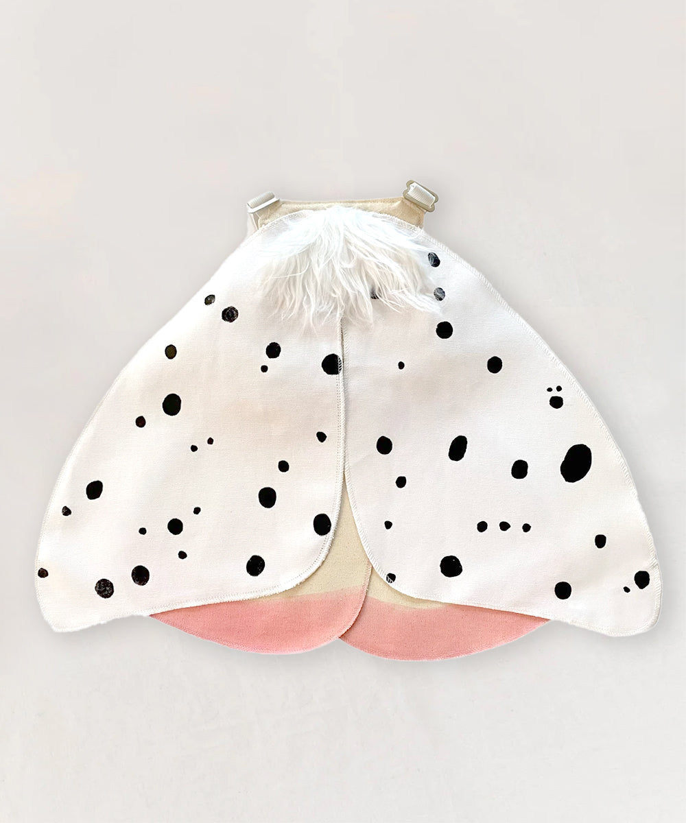 Le Leopard Moth Wings costume with white and black spots, pink accents, and fluffy white fur, shown flat on a white background.