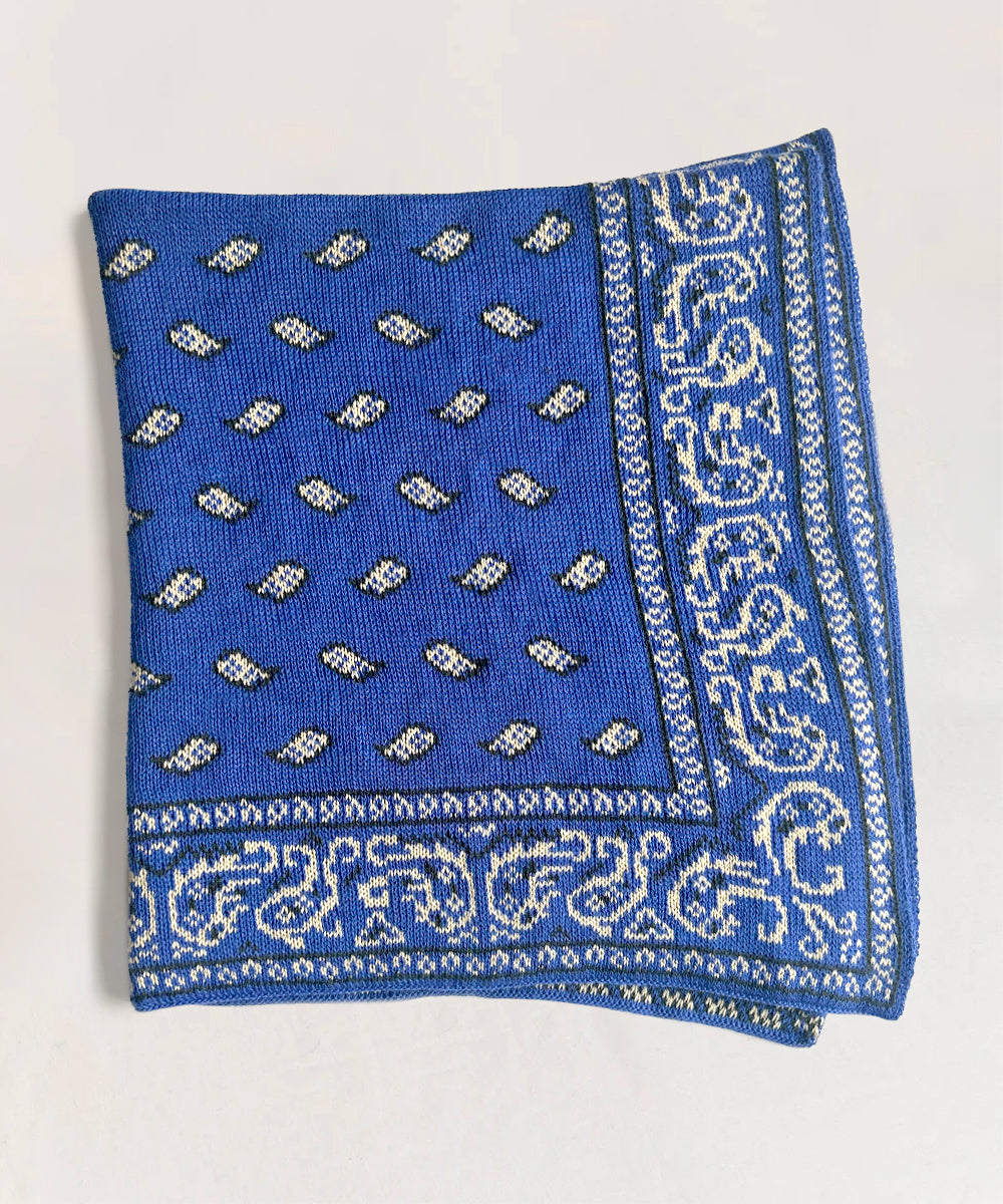 Bandana Blanket: Blue knitted with a paisley pattern and intricate border design.